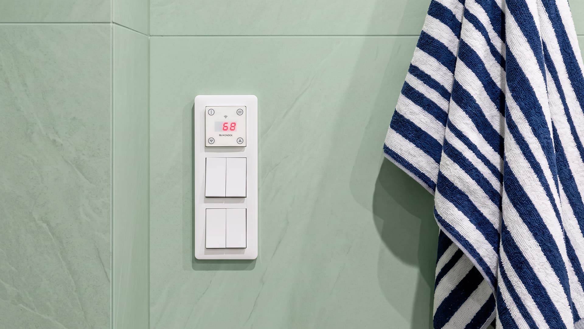 <p data-block-key="sclvk">Mondexin E2-kiukaita voi hallita helposti erillisohjaimella, jonka voi asentaa esimerkiksi valokatkaisimien oheen. Näin ohjaimesta tulee huomaamaton, tyylikäs osa saunan sisustusta.</p>